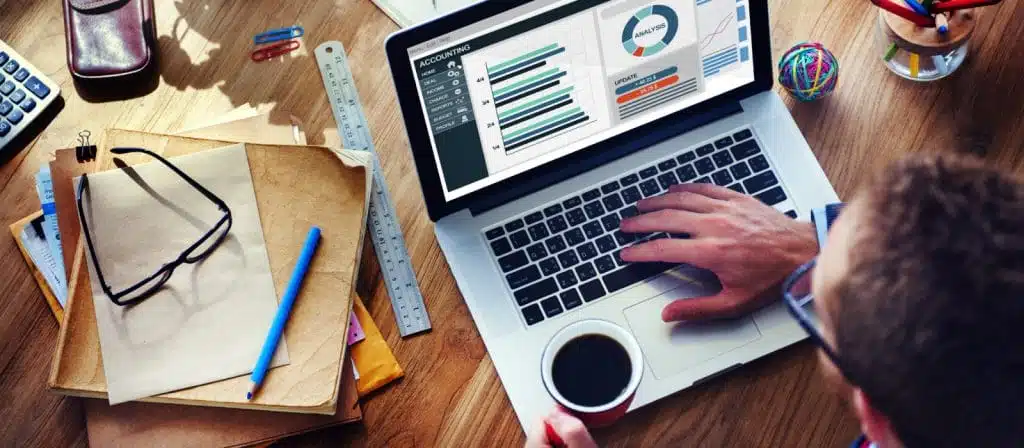 Man Analysis Business Accounting on Laptop