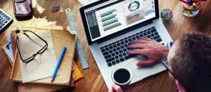 Man Analysis Business Accounting on Laptop